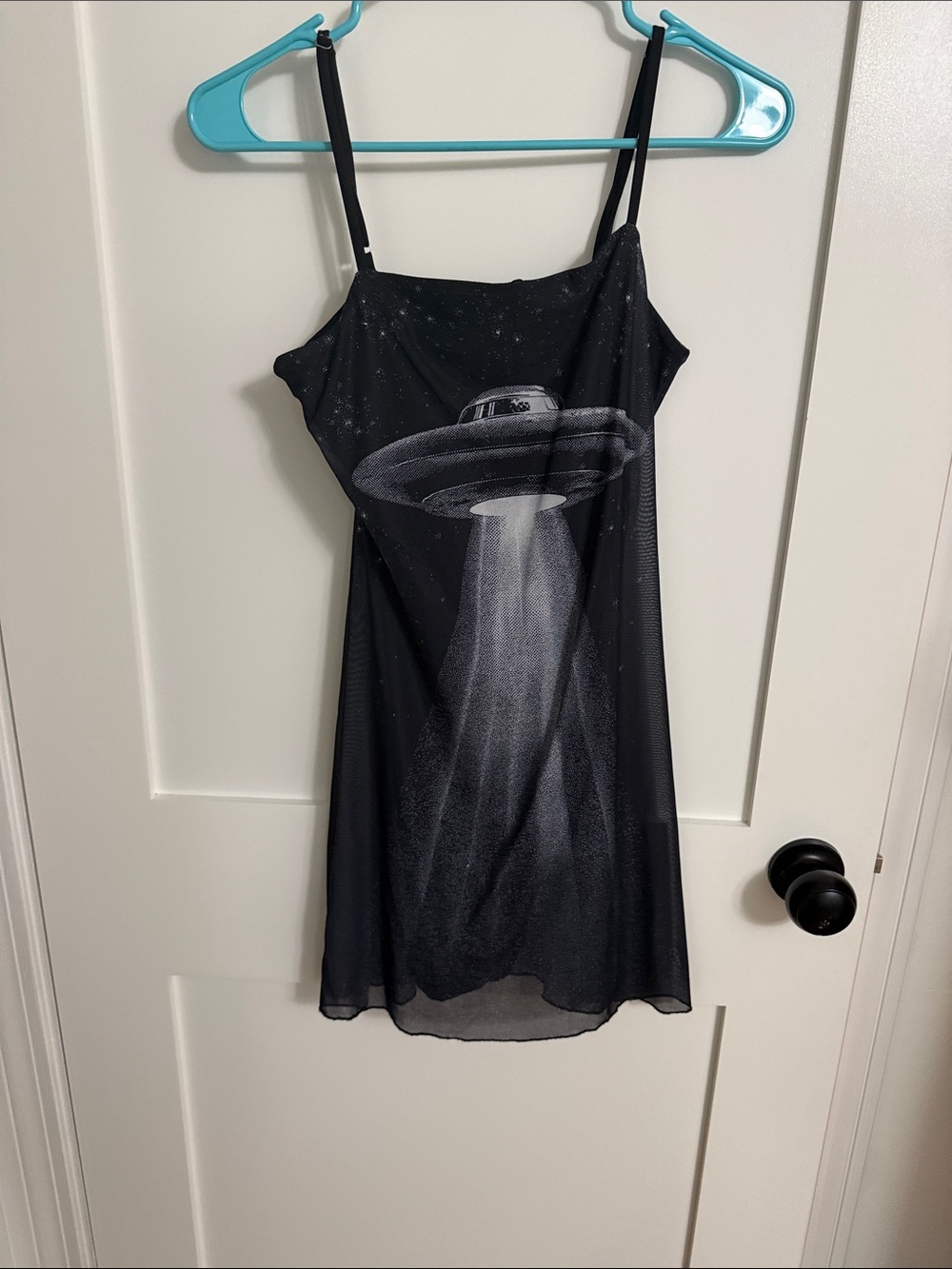 Dressed in LALA Black Mini Dress with Silver UFO Beam